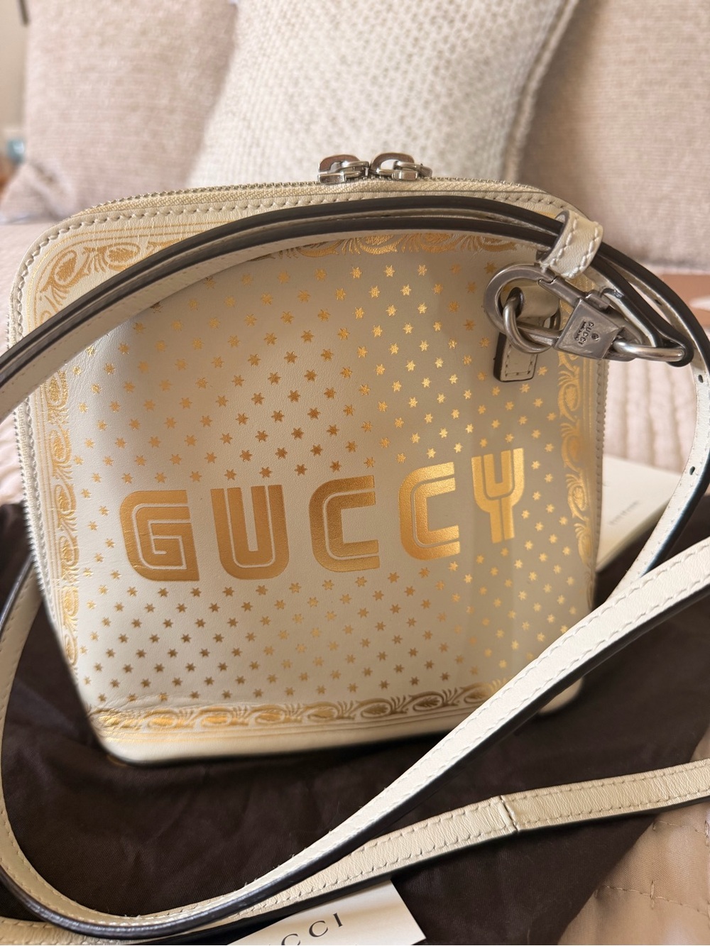 Authentic Gucci Cream Crossbody with Gold 'GUCCY' Print